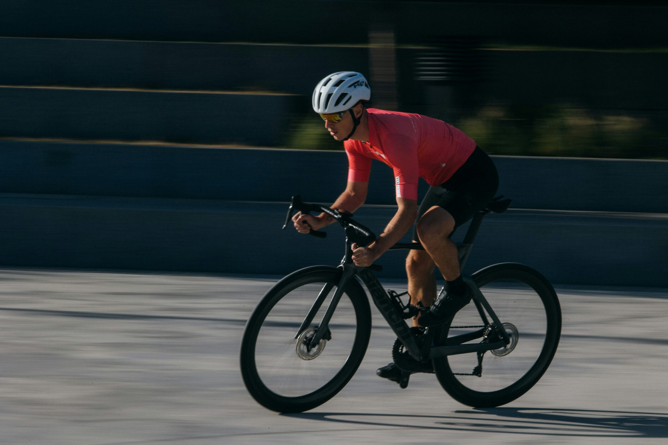 Cyclist wearing a helmet on the road